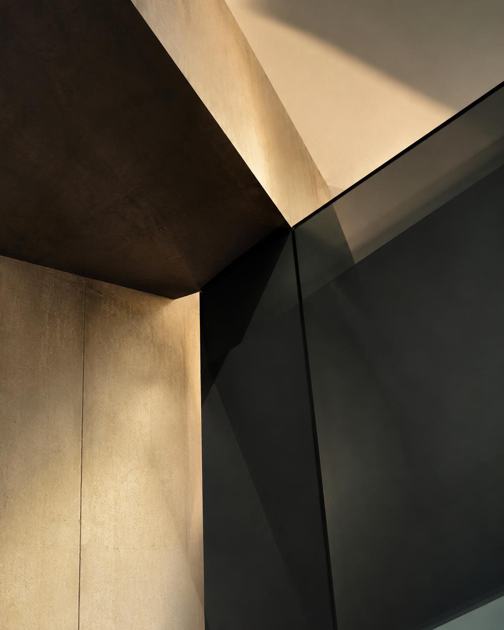 Intersecting planes of concrete and glass